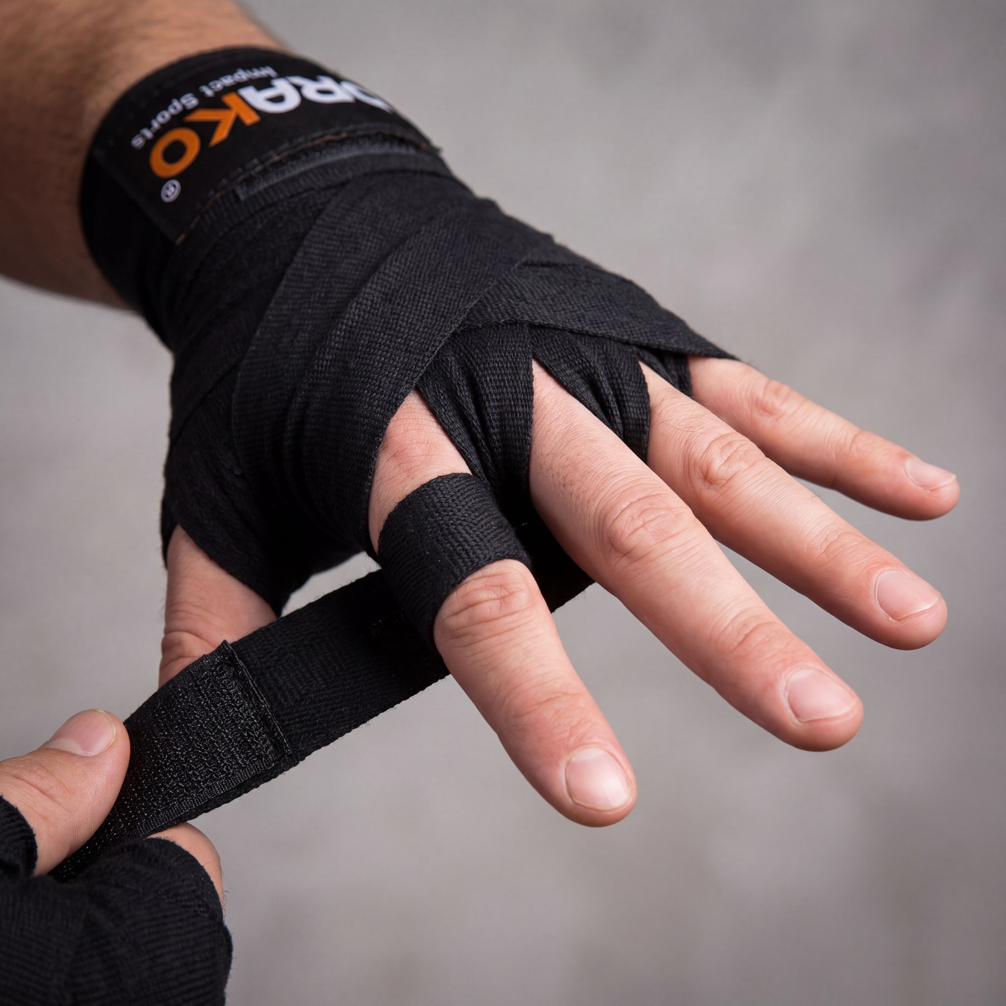 properly wrapped hands with boxing hand wraps secured at the wrist